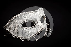 Silver ornate mask isolated on black