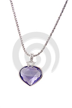 Silver pendant and blue heart shaped diamond