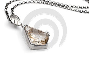 Silver pendant with quartz photo