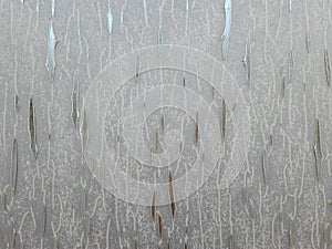 Silver plastic foil background. Bright and scratched surface.