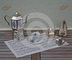 Silver-plated english tea set with a bouquet of forget-me-nots and lilies of the valley on hand-painted enamel inlays