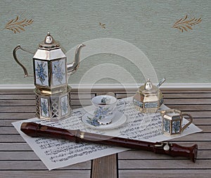 Silver-plated english tea set with a bouquet of forget-me-nots and lilies of the valley on hand-painted enamel inlays