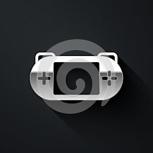 Silver Portable video game console icon isolated on black background. Gamepad sign. Gaming concept. Long shadow style