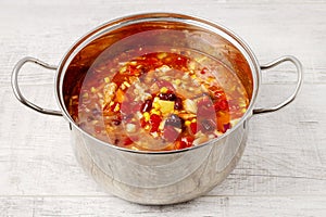 Silver pot with goulash soup