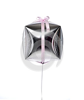 Silver present gift box balloon ballon with pink bow for birthday or valentines day party isolated on white