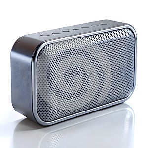 Silver rectangular portable Bluetooth speaker with perforated grille and buttons on white
