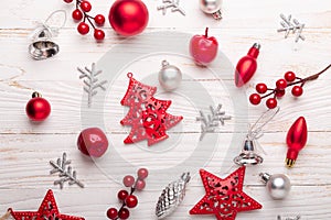 Silver red christmas gifts on white wooden background