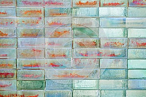 Silver and red glass blocks wall.