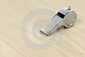 Silver referee whistle