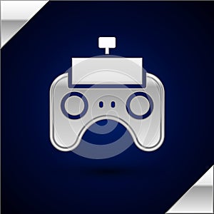 Silver Remote control icon isolated on dark blue background. Vector