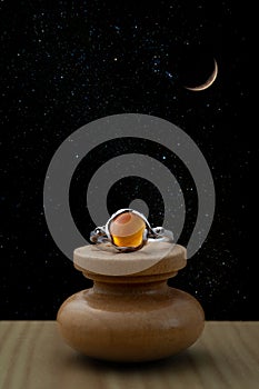 Silver ring with amber stone cabochon with night sky