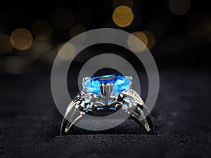 The Silver Ring is decorated with a Blue Gem