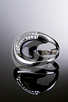 Silver ring with diamonds.