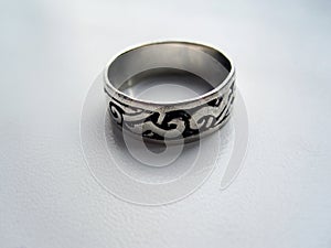 Silver ring on gray background