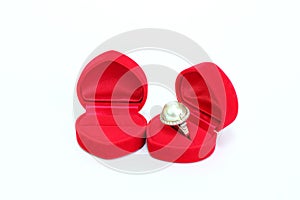 Silver ring with pearl and diamonds in red velvet box