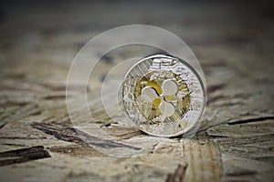 Silver ripple coin