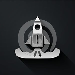 Silver Rocket icon isolated on black background. Long shadow style. Vector