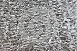 Silver rumpled background with foil texture