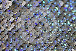 Silver sequin fabric close up