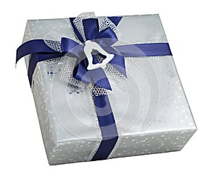 Silver shiny gift box paper wrap blue ribbon bow bell decoration isolated