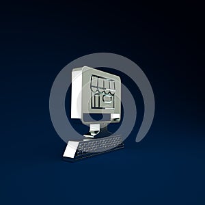 Silver Shopping building on screen computer icon isolated on blue background. Concept e-commerce, e-business, online