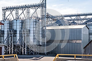 Silver silos on agro-processing and manufacturing plant for processing drying cleaning and storage of agricultural products, flour