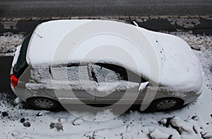 Snow covered car