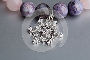 Silver snowflake on amethyst bracelet