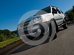Silver Sports Utility Vehicle low angle