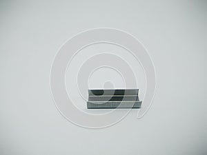 Silver staples clip office stationary equipment isolated on a white background