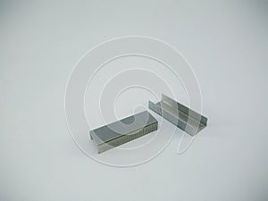 Silver staples clip office stationary equipment  on a white background