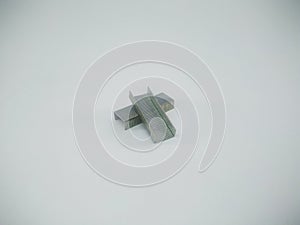 Silver staples clip office stationary equipment  on a white background