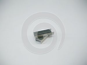 Silver staples clip office stationary equipment  on a white background