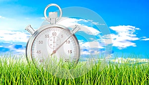 Silver stopwatch, chronometer on green grass. 3D rendering