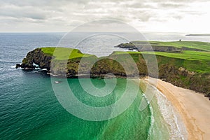 Silver Strand, a sandy beach in a sheltered, horseshoe-shaped bay, situated at Malin Beg, near Glencolmcille, in south-west County