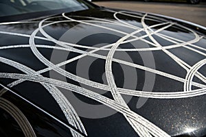 Silver streamlines on black background