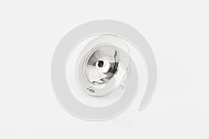 Silver support for curtain poles on white background