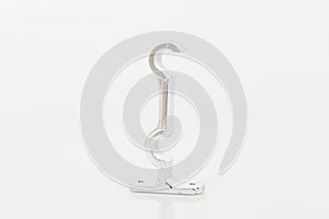 Silver support for curtain poles on white background