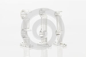 Silver support for curtain poles on white background