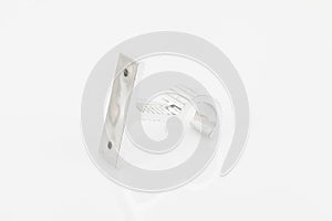 Silver support for curtain poles on white background