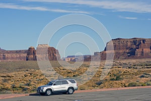 Silver SUV driving in Utah.