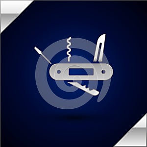 Silver Swiss army knife icon isolated on dark blue background. Multi-tool, multipurpose penknife. Multifunctional tool