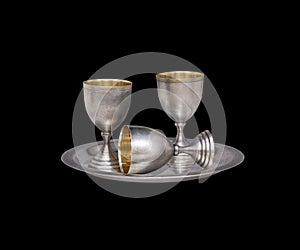 Silver tableware on black background