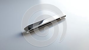 Silver tie is laying on a white surface