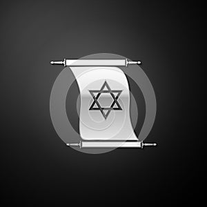 Silver Torah scroll icon isolated on black background. Jewish Torah in expanded form. Torah Book. Star of David symbol