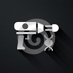 Silver Transfer liquid gun in biological laborator icon isolated on black background. Long shadow style. Vector