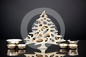 silver tree-shaped candle holder with tealight candles