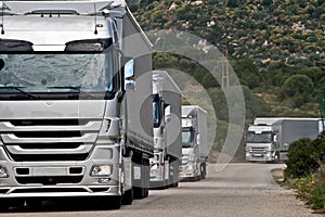 Silver trucks convoy