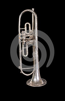 Silver trumpet isolated on a black background. Musical instrument