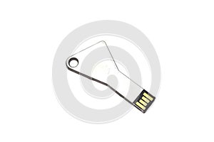 Silver USB-stick shaped like a key isolated on white background